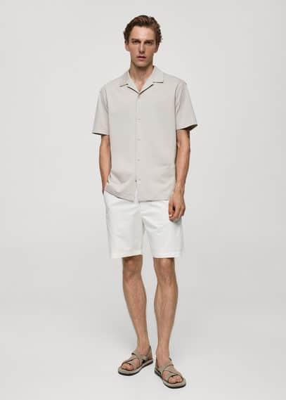 Short sleeved cotton shirt - Men | MANGO USA Product Image