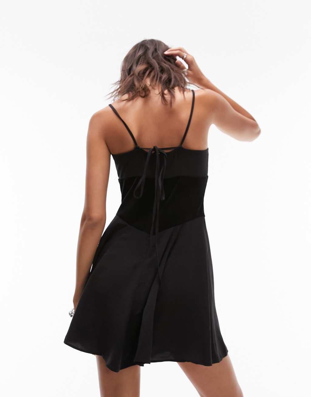 Topshop velvet and cut-out mesh mix flippy strappy mini dress in black Product Image