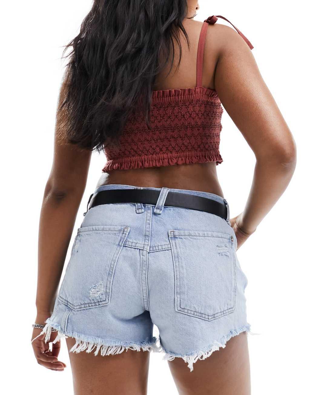 Free People classic distressed shorts in mid wash blue Product Image