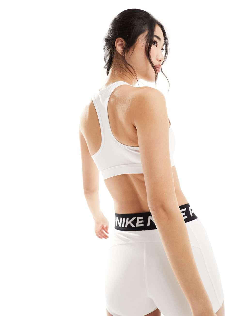 Nike Training swoosh medium support sports bra in white Product Image