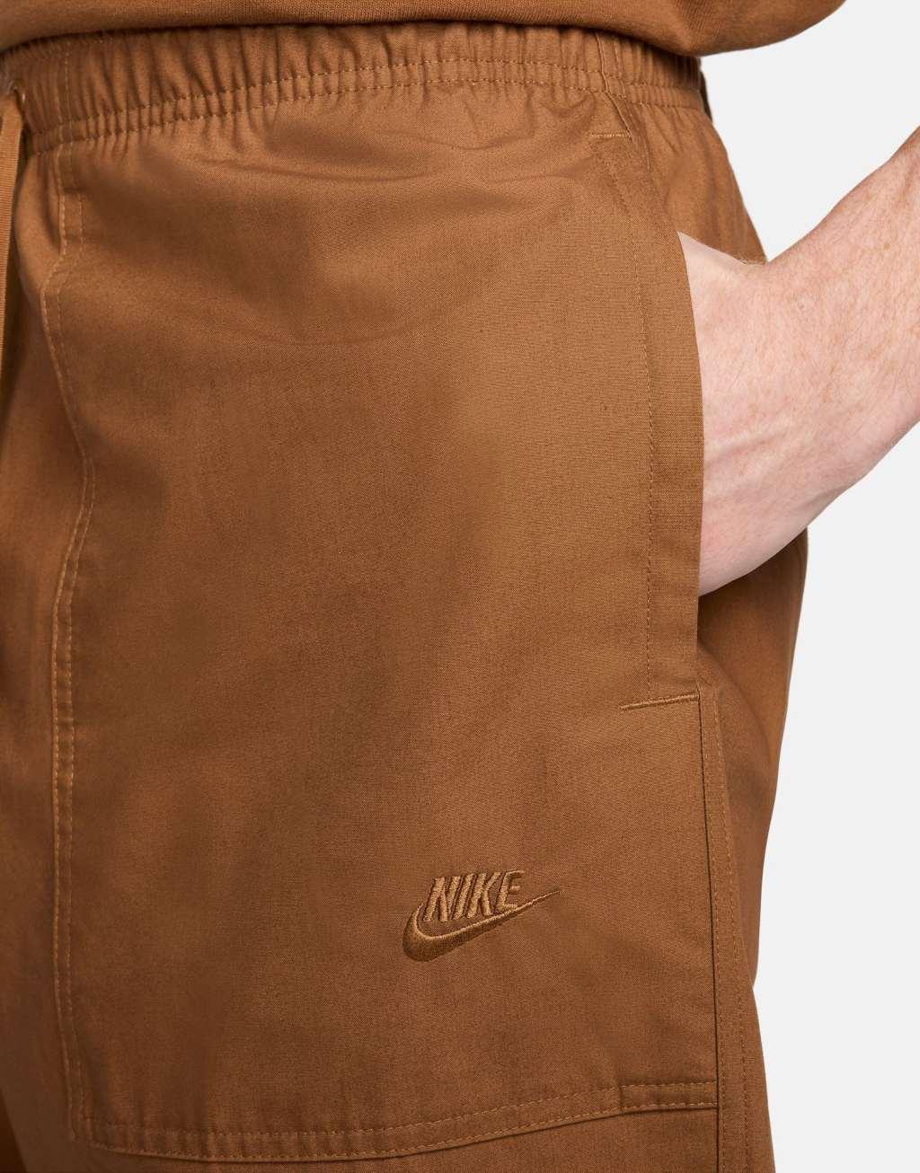 Nike Club woven Barcelona pants in brown Product Image