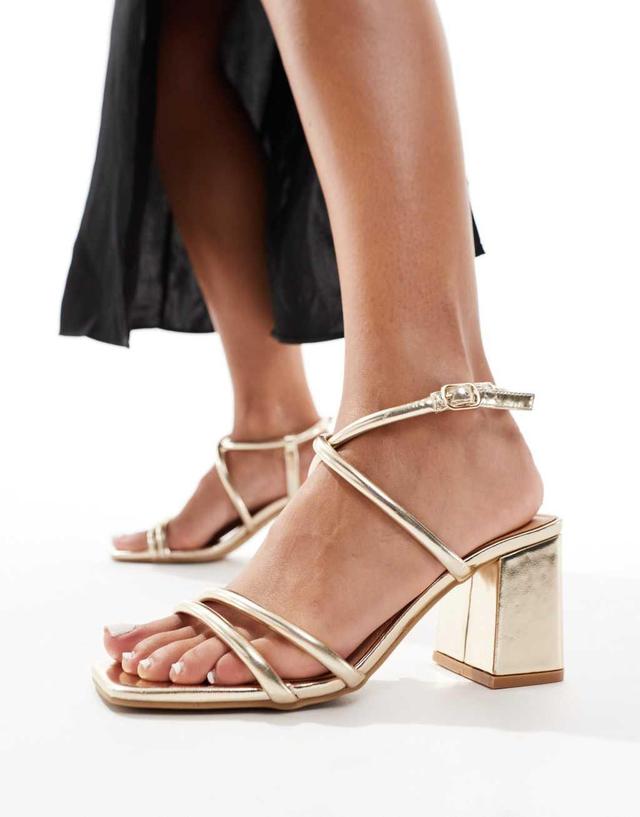 SEQWL Wide Fit mid block heel sandals in gold Product Image