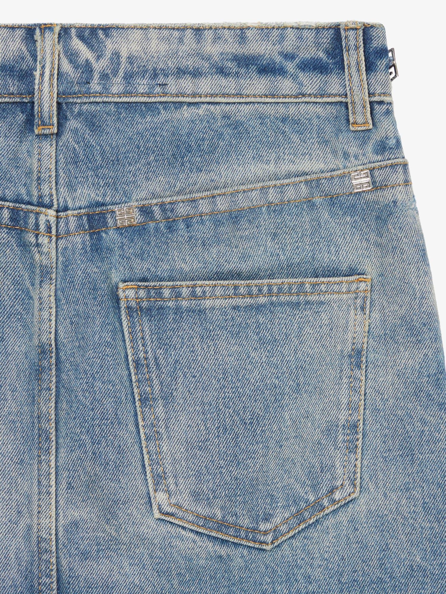 Mini skirt in denim with chain details Product Image