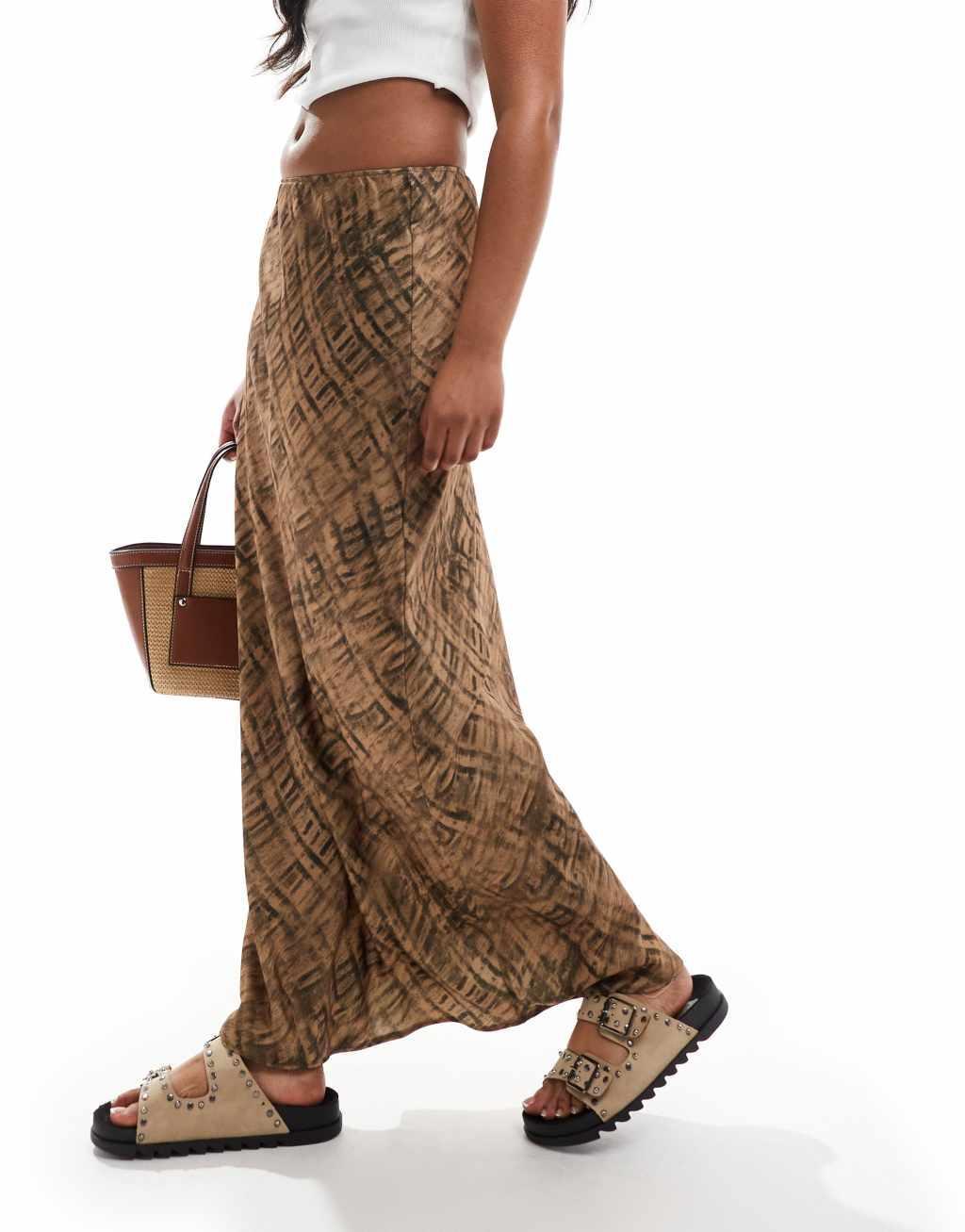 ASOS DESIGN satin bias maxi skirt in blurred animal print Product Image