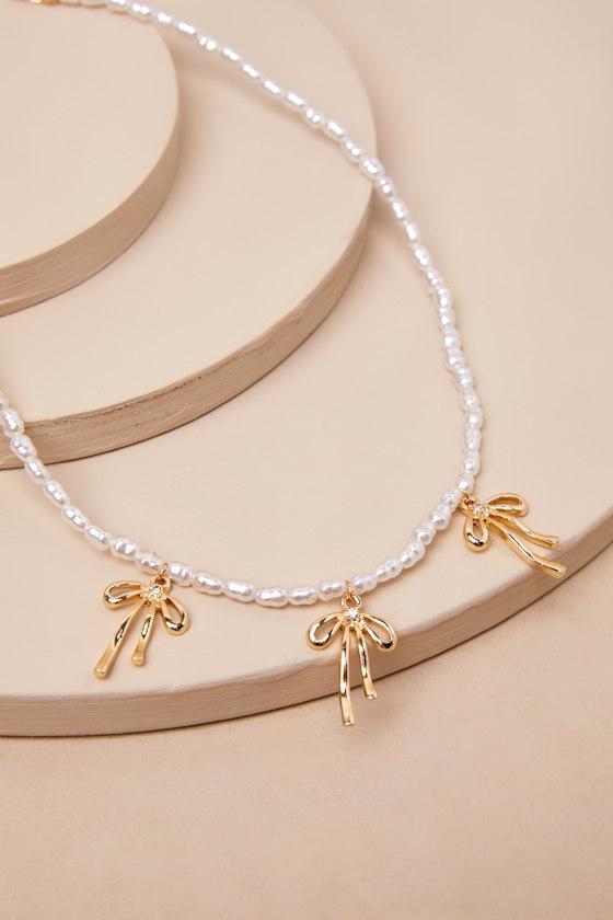 Desired Perfection Gold Pearl Rhinestone Bow Charm Necklace Product Image