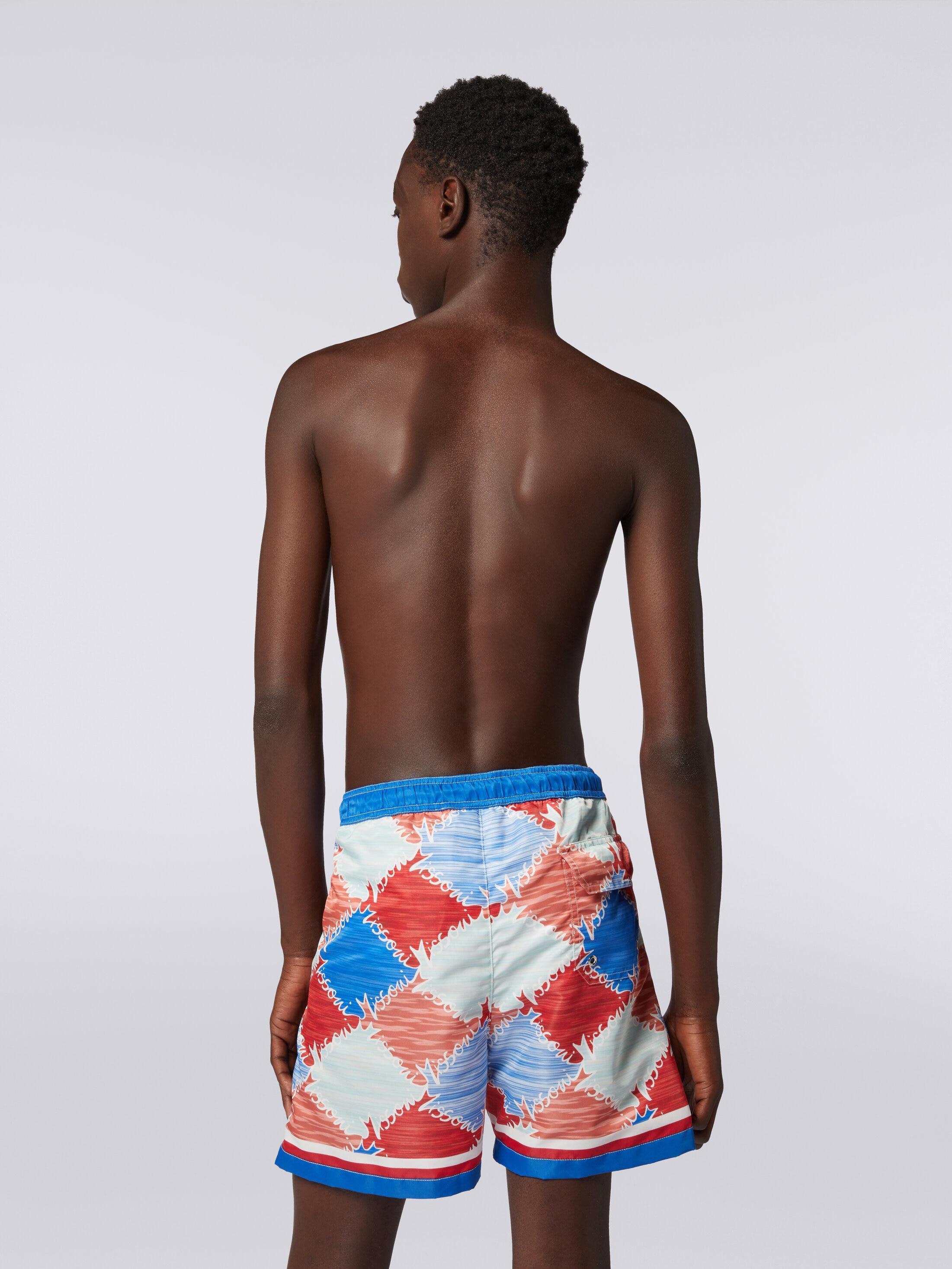 Swimming trunks in slub nylon with logo print Product Image