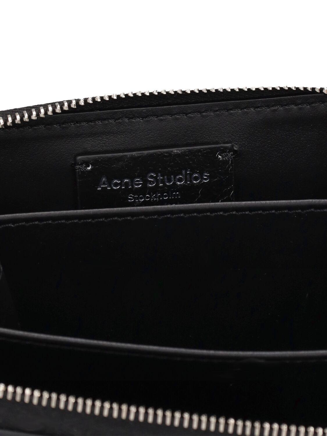 Acite Leather Zip Around Wallet In Black Product Image