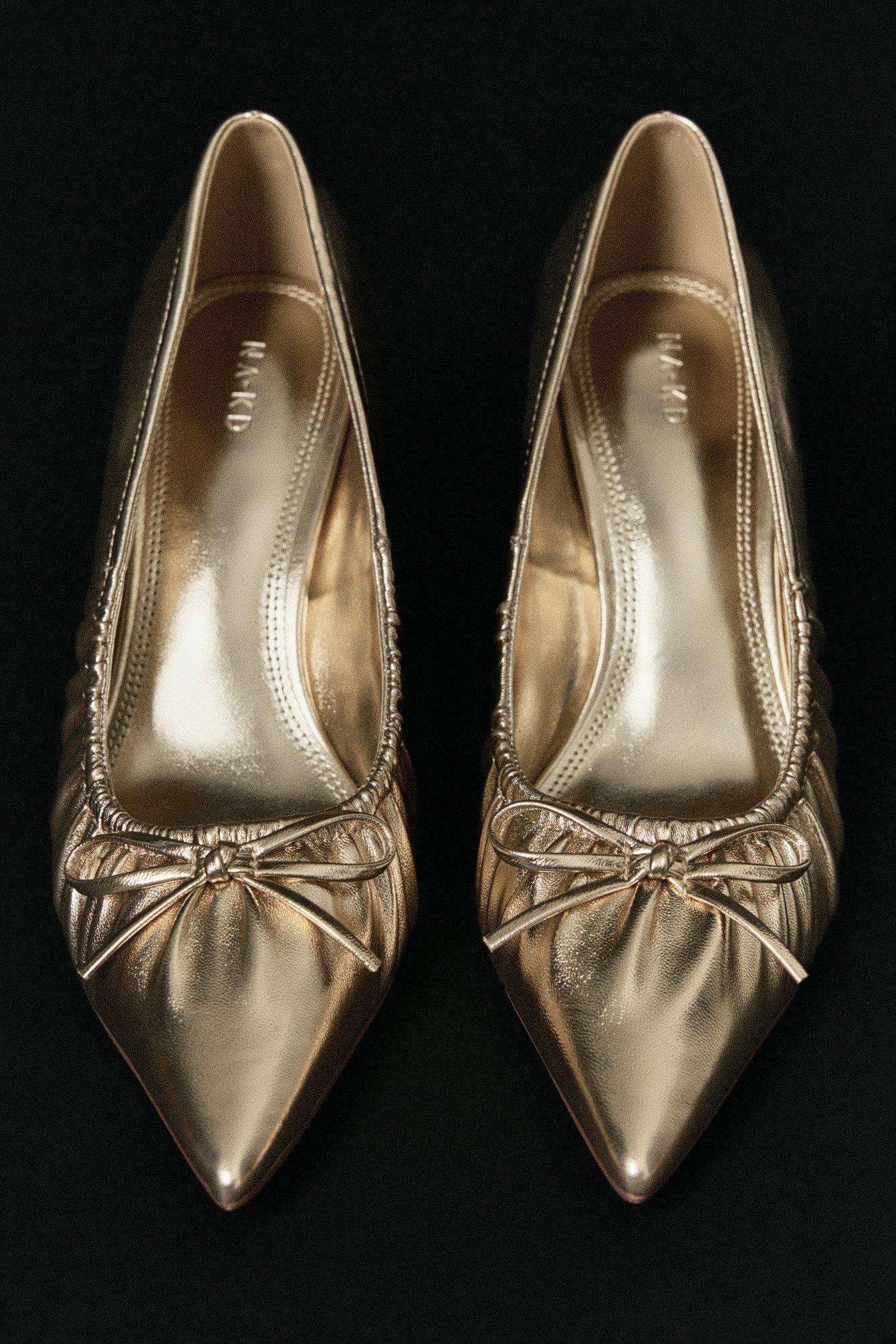 Gold Bow Detail Pumps product image