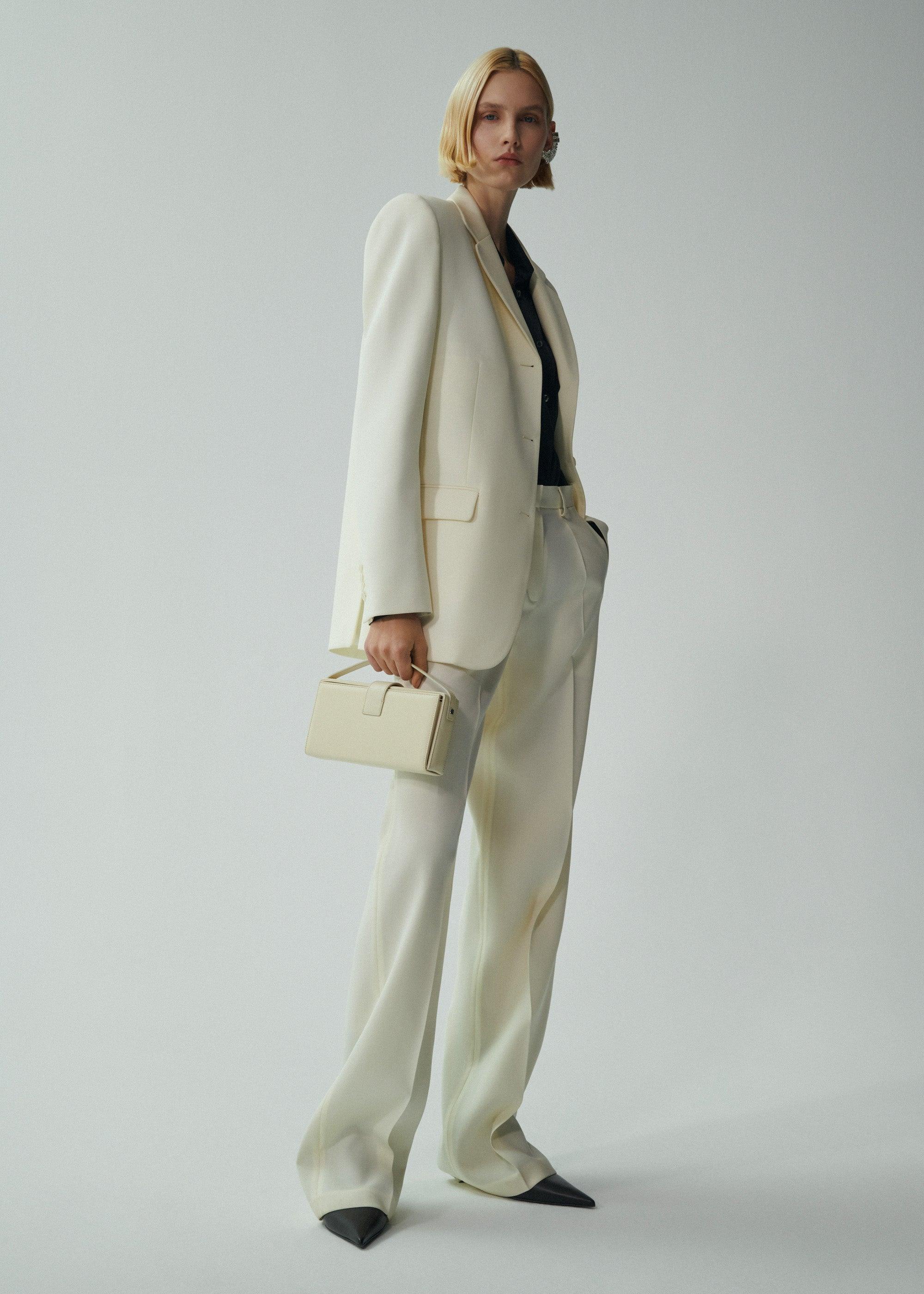 Wide leg tailored pants in cream Product Image