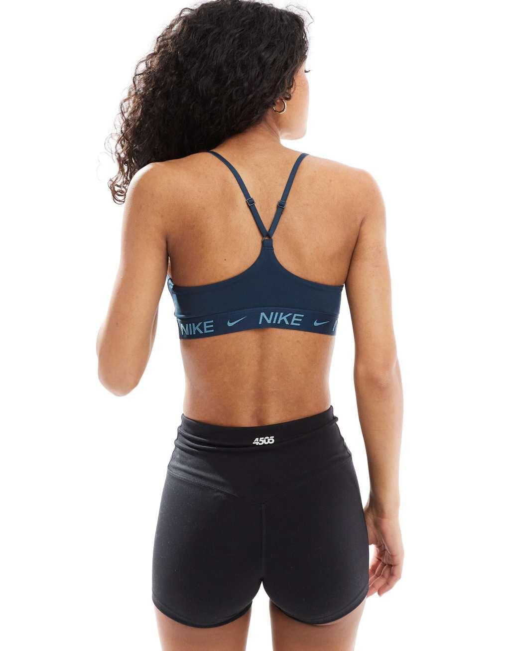 Nike Training Dri-Fit Indy light support sports bra in navy Product Image