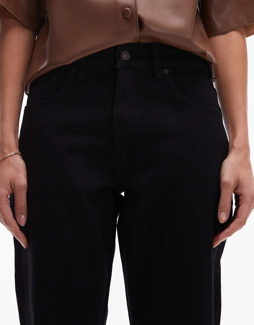 Topshop cropped mid rise straight jeans with raw hems in black Product Image