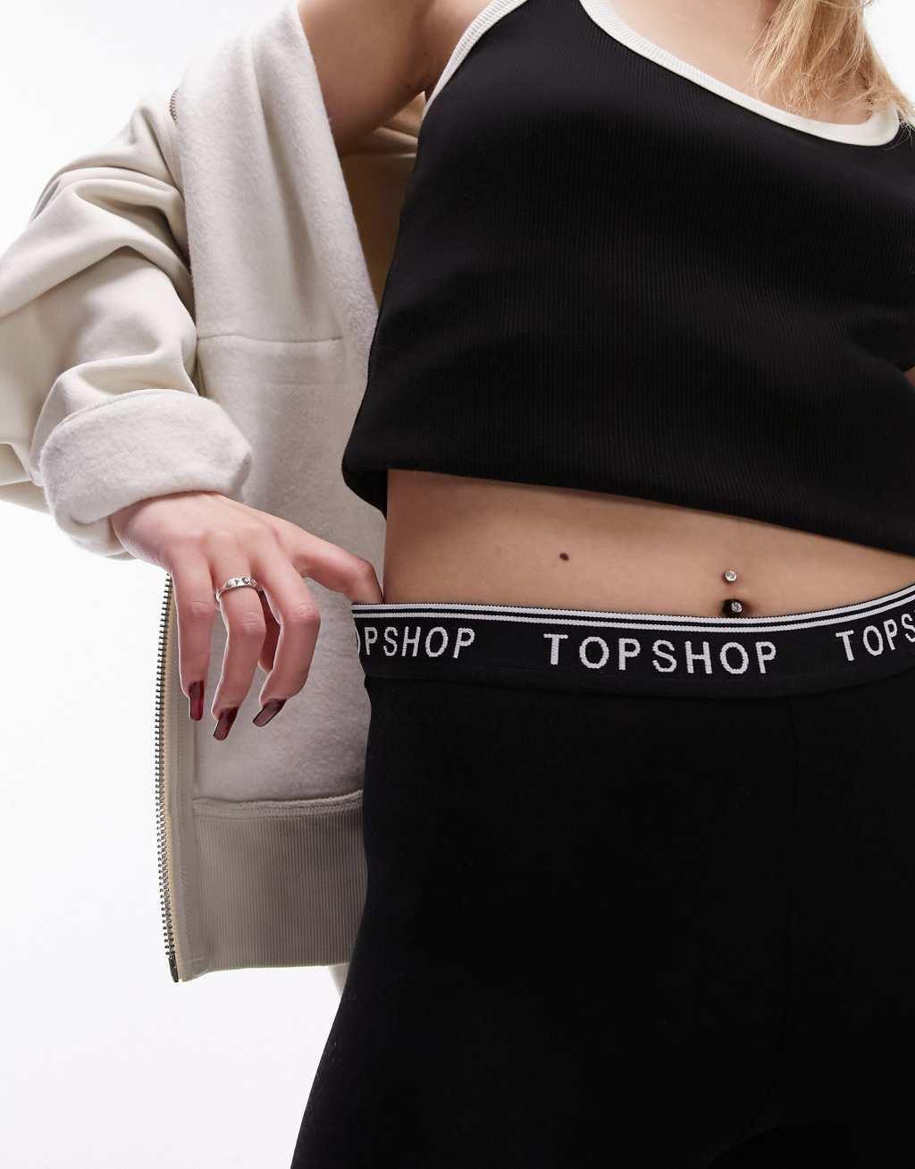 Topshop Petite branded elastic legging in black Product Image