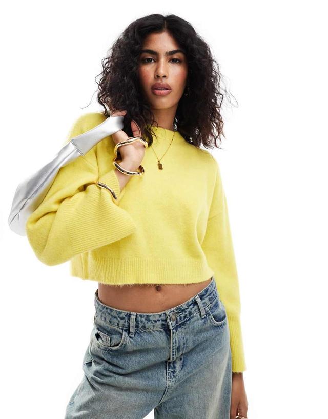 ASOS DESIGN crew neck boxy sweater with wide cuffs in yellow Product Image