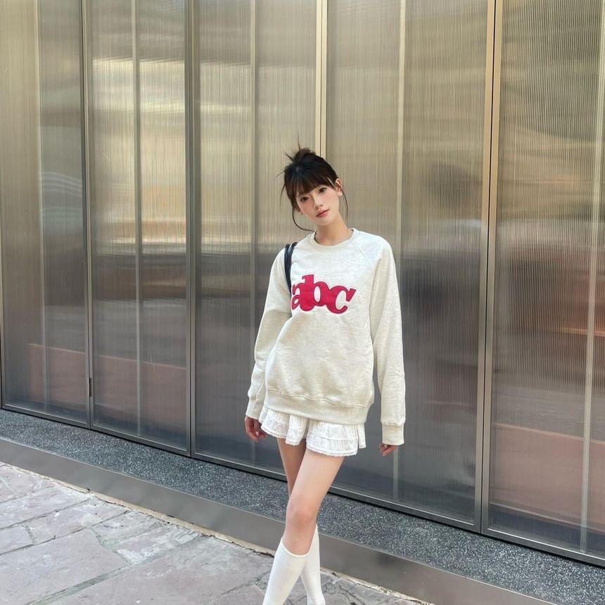 Long Sleeve Lettering Embroidered Loose-Fit Pullover Product Image