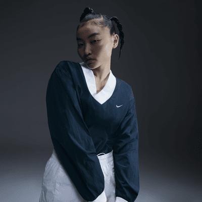 Womens Nike Sportswear Essential Loose UV Woven Long-Sleeve V-Neck Top Product Image