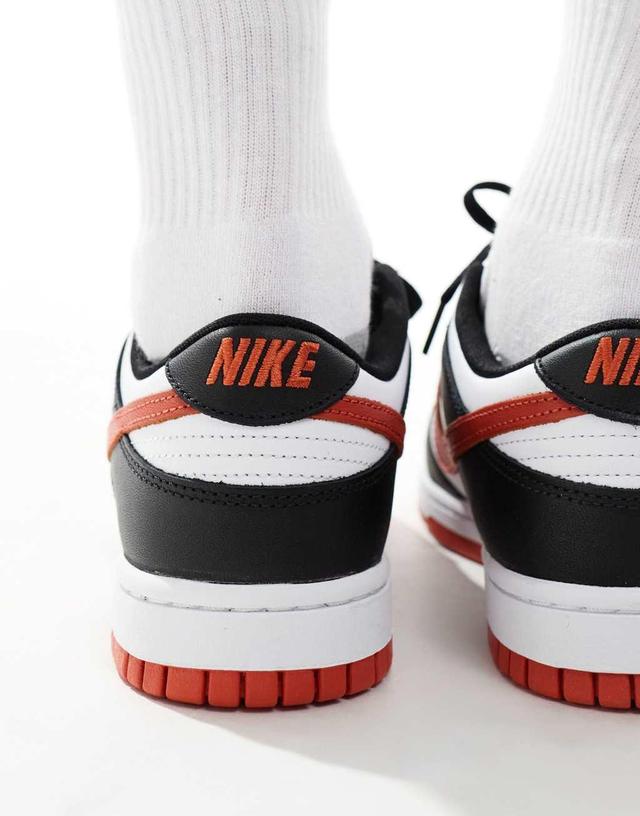 Nike Dunk Low Retro sneakers in white, black and red Product Image