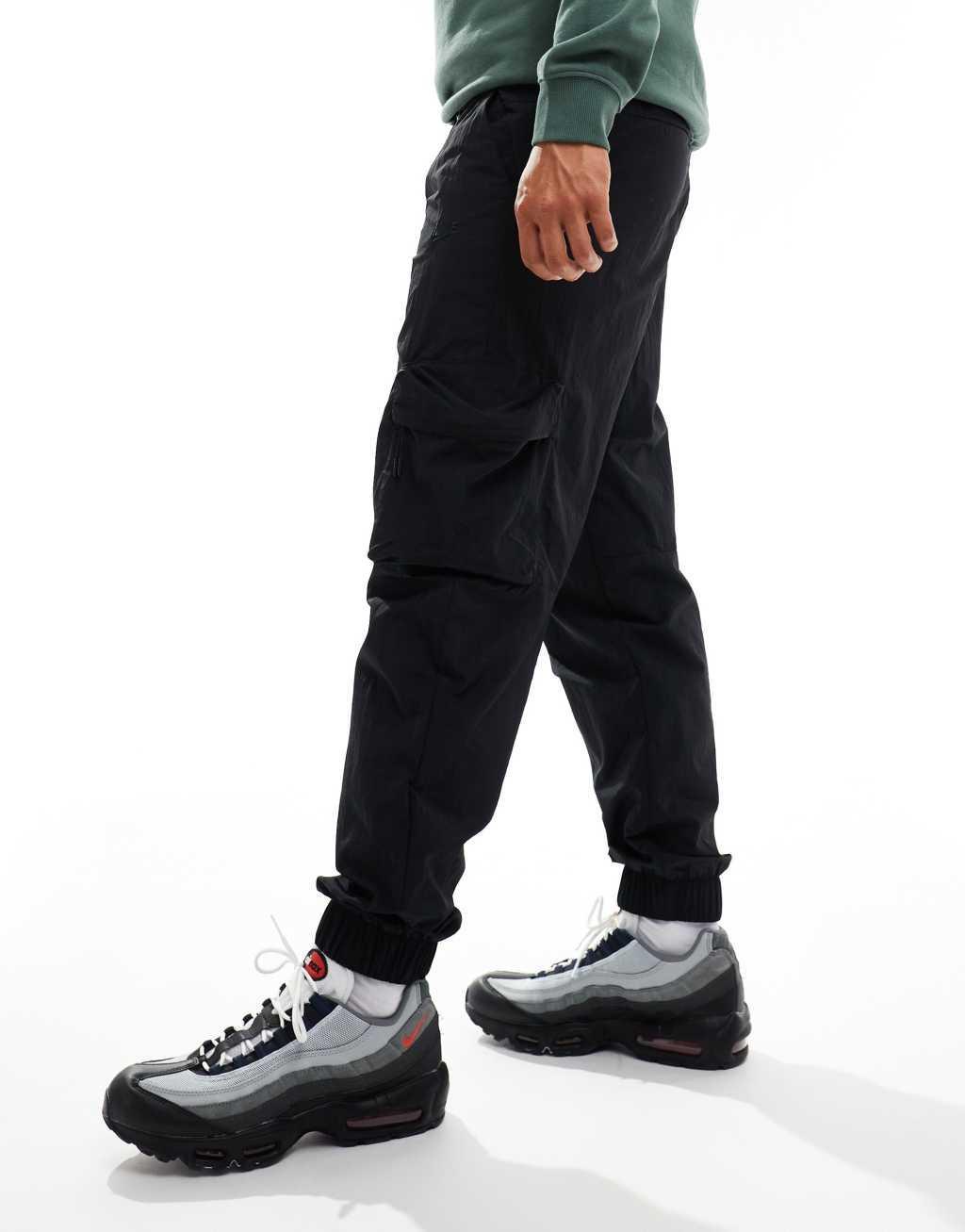 Nike Tech woven cargo pants in black Product Image