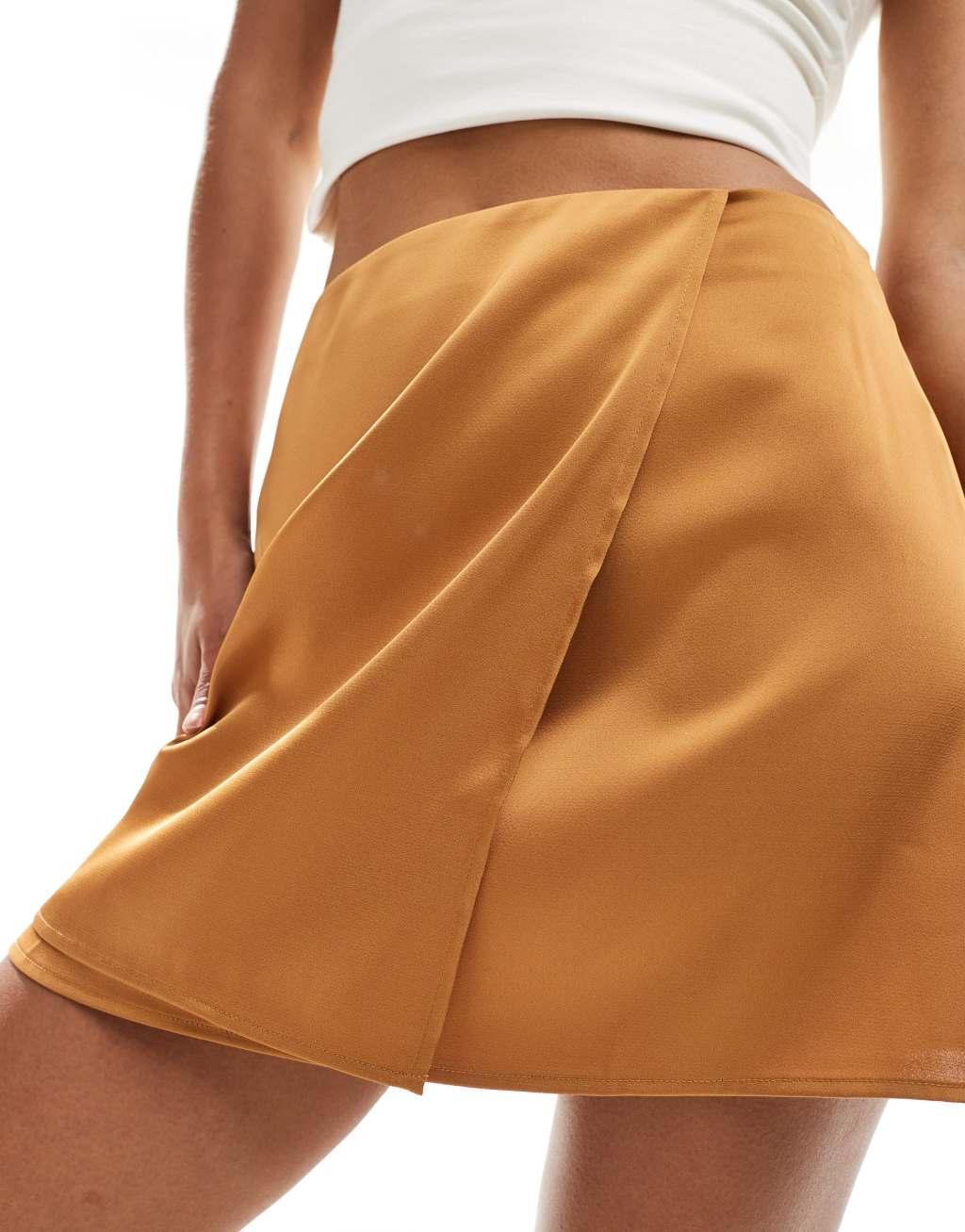 ASOS DESIGN satin wrap mini skirt in golden dusk Product Image