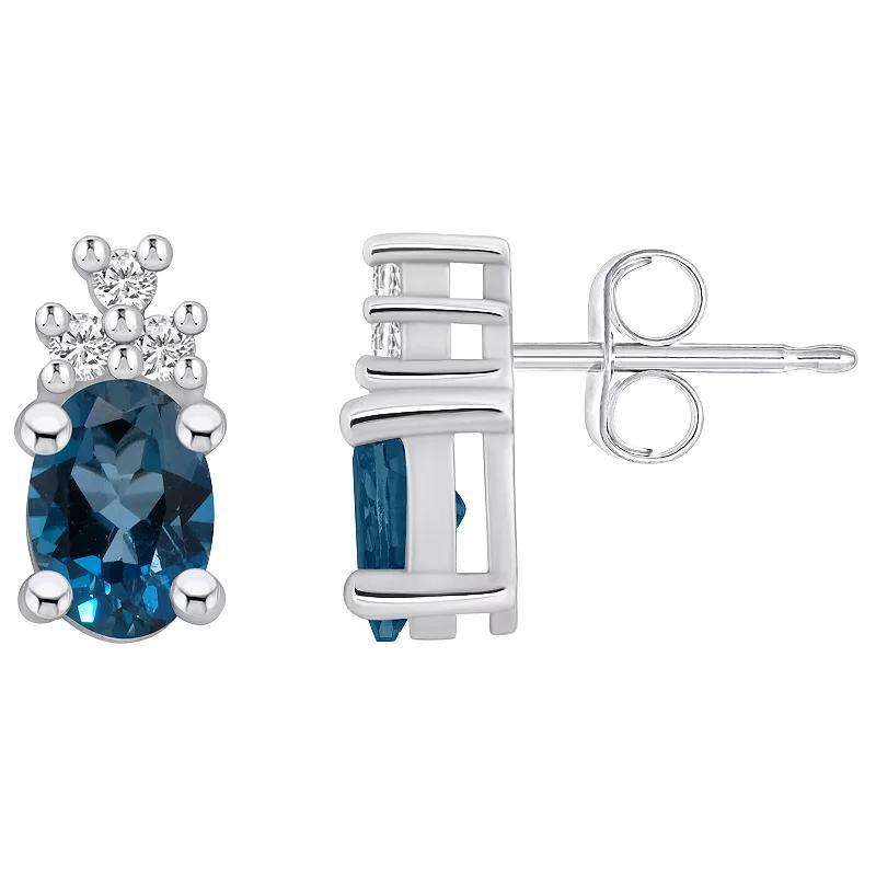 Alyson Layne 14k White Gold Oval London Blue Topaz & 1/7 Carat T.W. Diamond Earrings, Womens Product Image