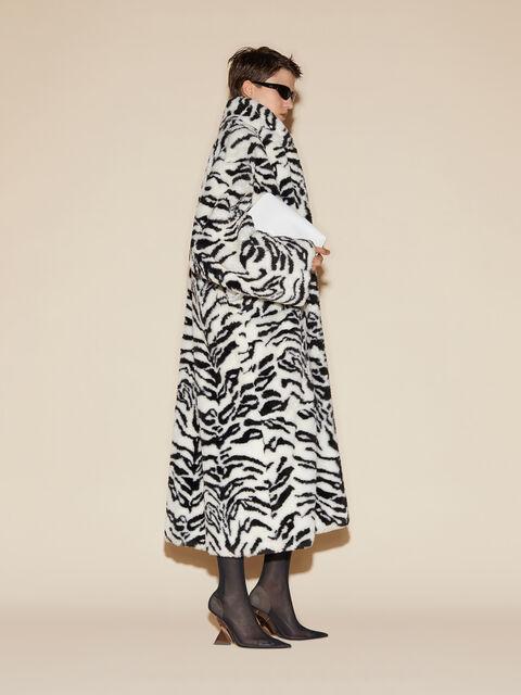 White and black long fur coat Product Image