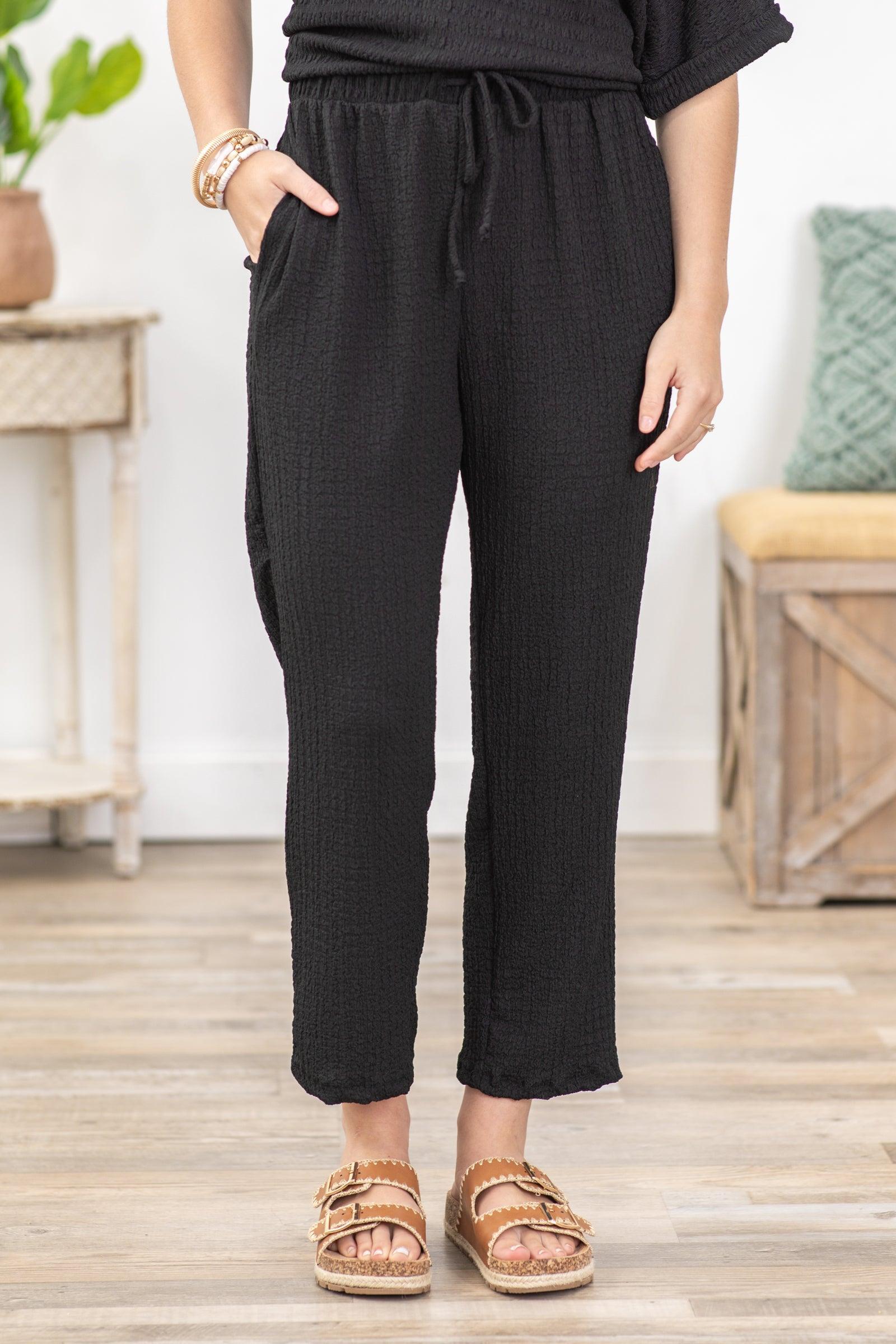 Black Solid Textured Straight Crop Leg Pants Product Image