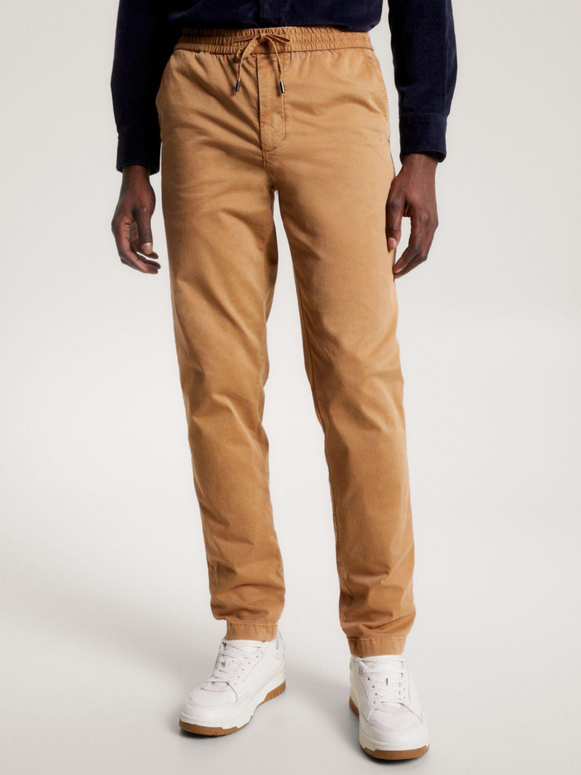 Tommy Hilfiger Men's Relaxed Tapered Garment-Dyed Chino - Brown - 34W x 30L Product Image