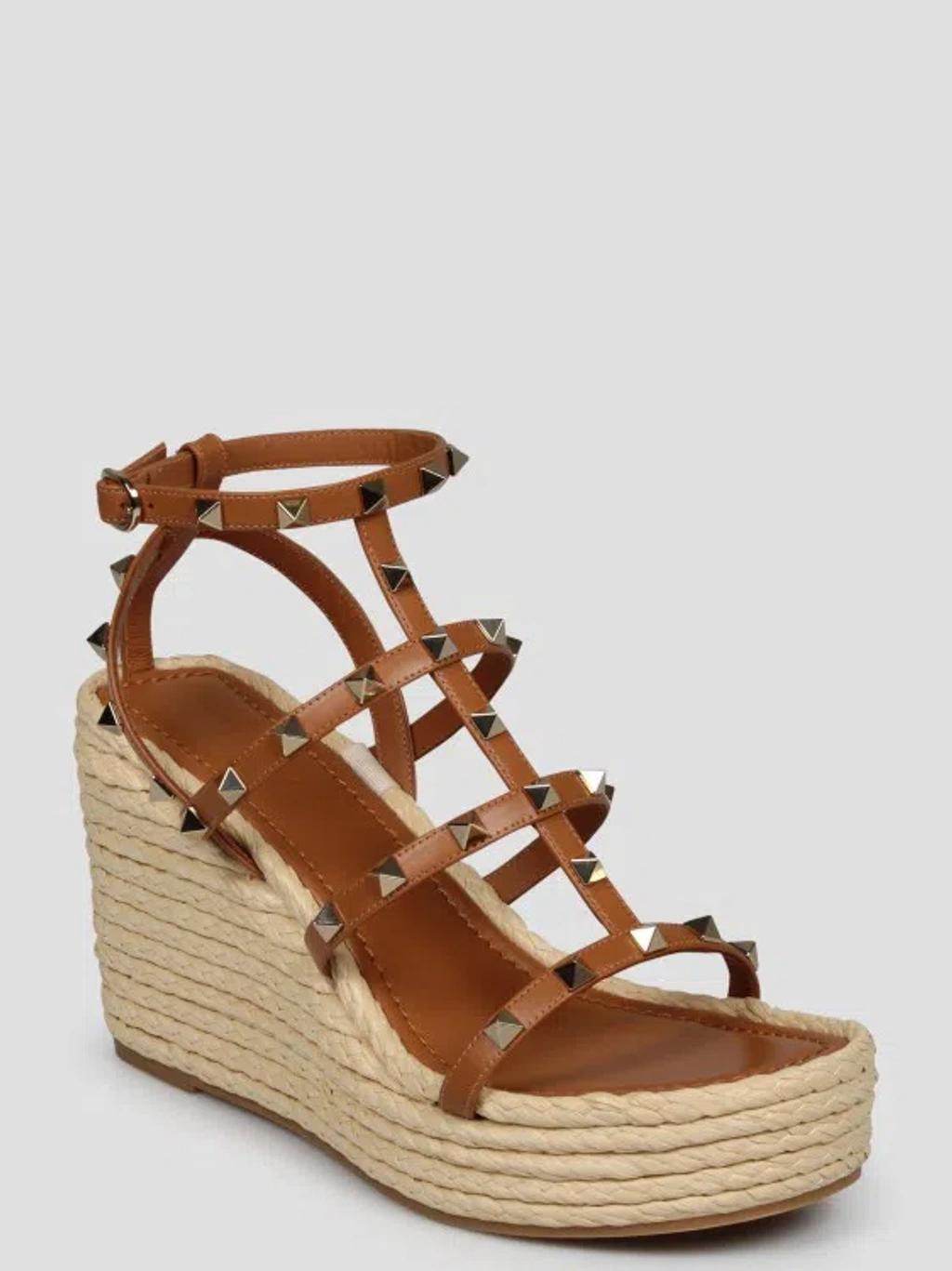 Valentino Rockstud Caged 95 Leather Wedge Sandal In Brown Product Image