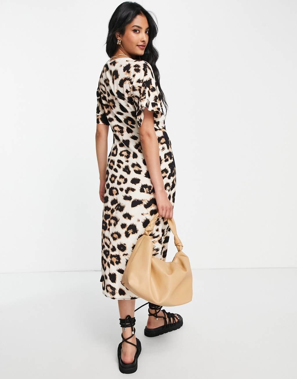 Vero Moda Aware wrap midi dress in leopard print Product Image