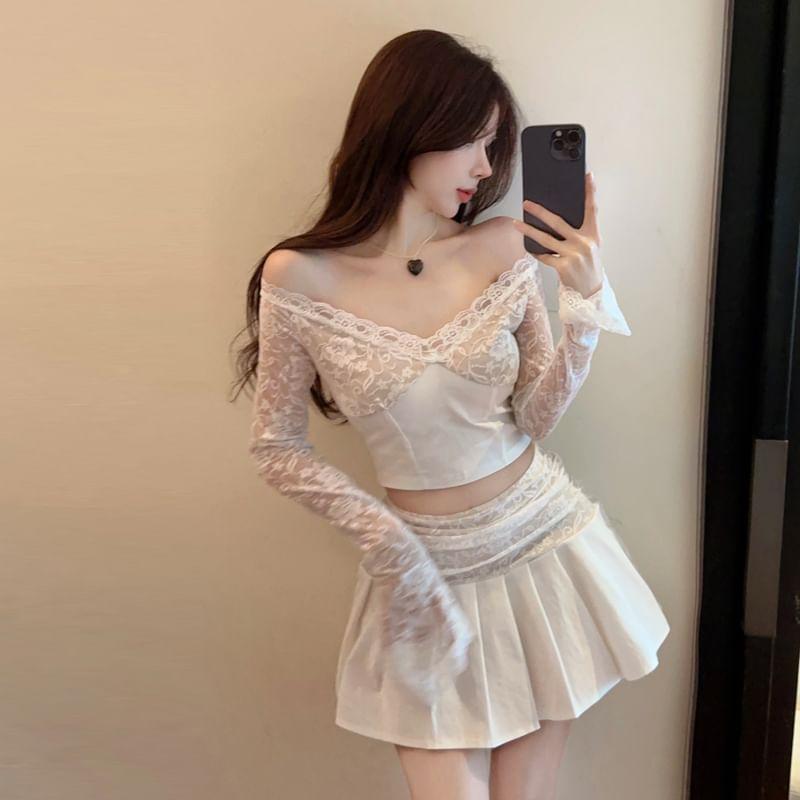 Set: Long-Sleeve Off Shoulder Lace Panel Crop Top + High Rise Plain Mini Pleated Skirt Product Image