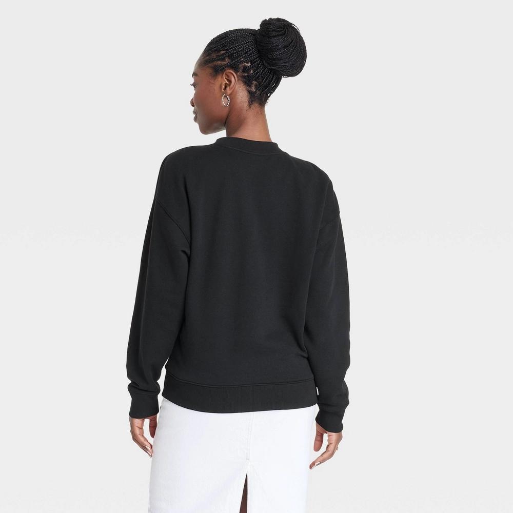 Women's Leisure Studio Oversized Pullover Sweatshirt - Universal Thread™ Product Image