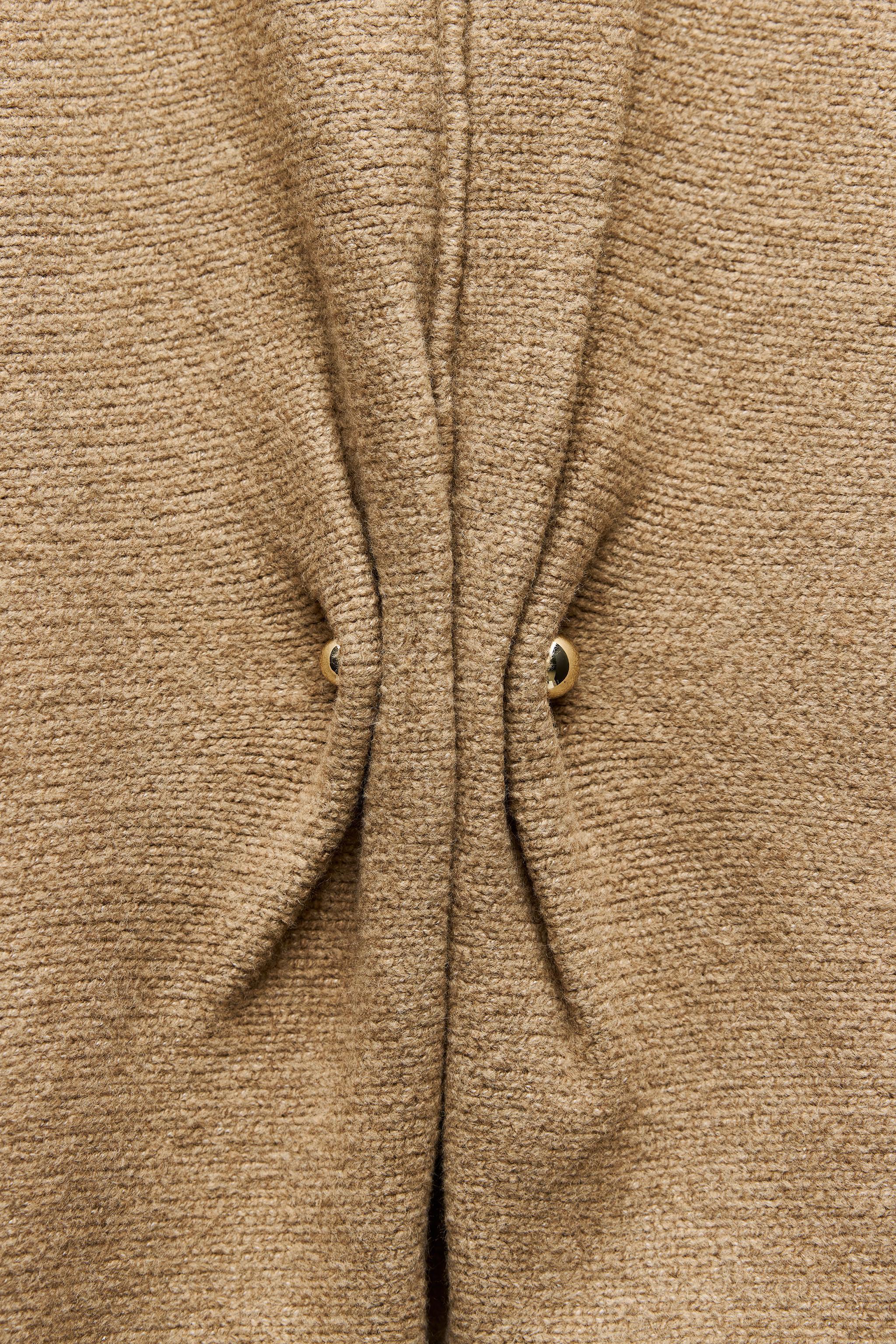 KNIT SWEATER WITH GOLDEN APPLIQUÉ Product Image