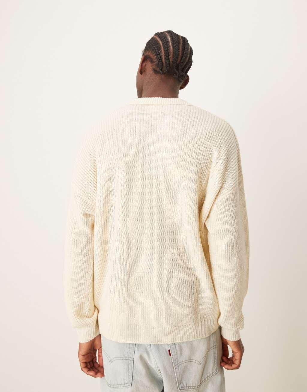 ASOS DESIGN oversized ribbed knit sweater with notch neck in ecru Product Image