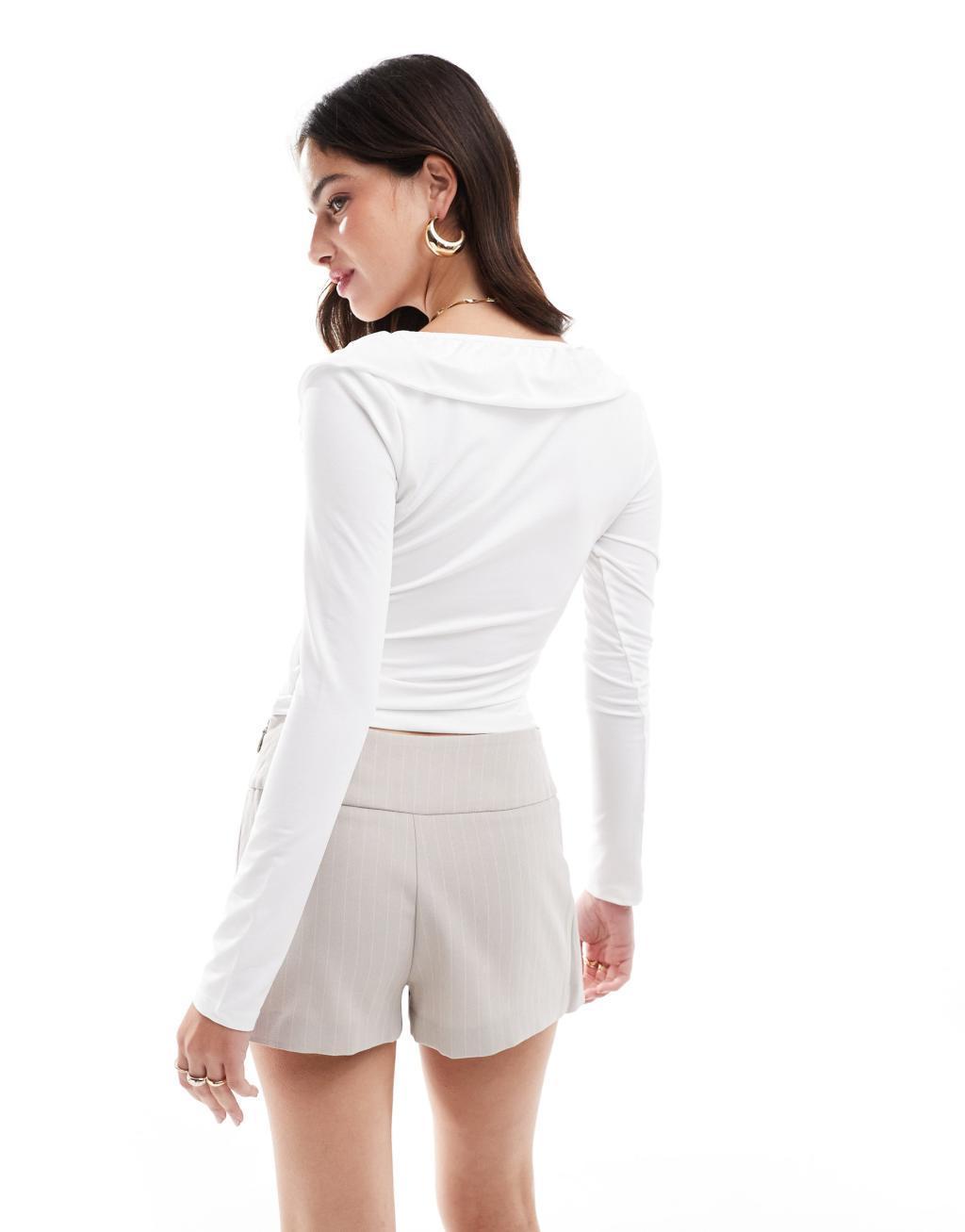 ASOS DESIGN frill wrap top with ruffle cuff in ivory Product Image