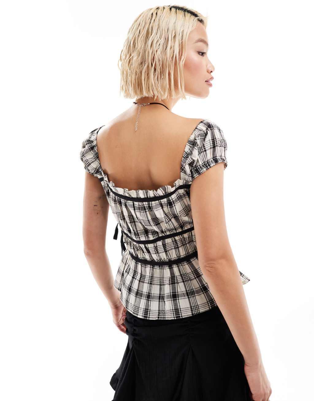 COLLUSION milkmaid top with open bow side in mono check Product Image