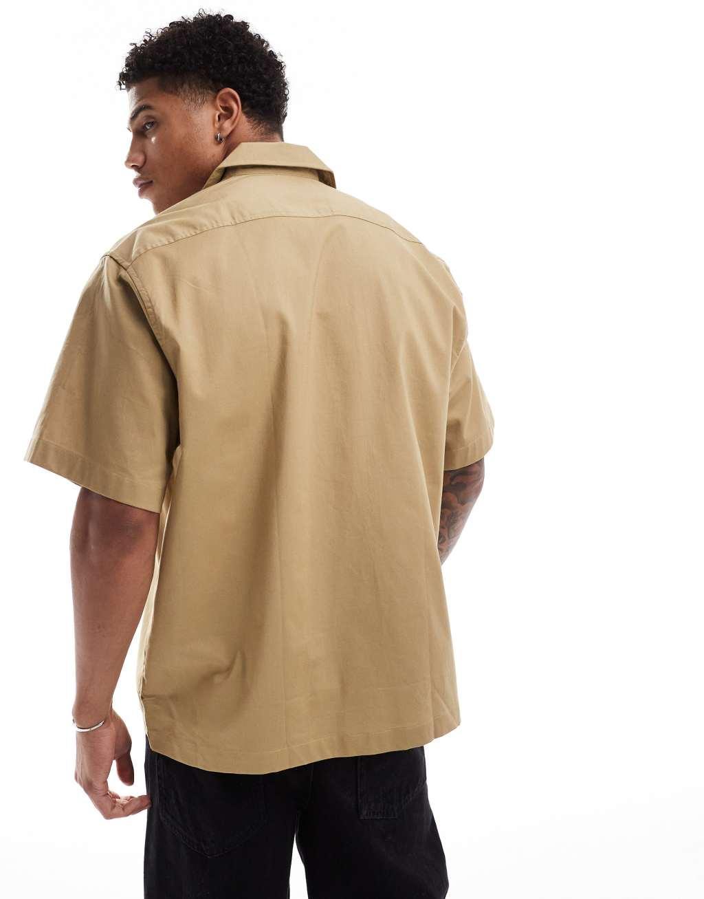 Selected Homme boxy oversized camp collar shirt with double pockets in beige Product Image