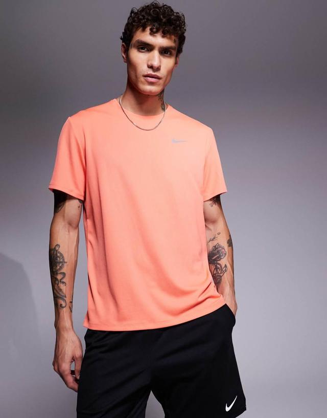 Nike Running Miler Dri-FIT t-shirt in orange Product Image