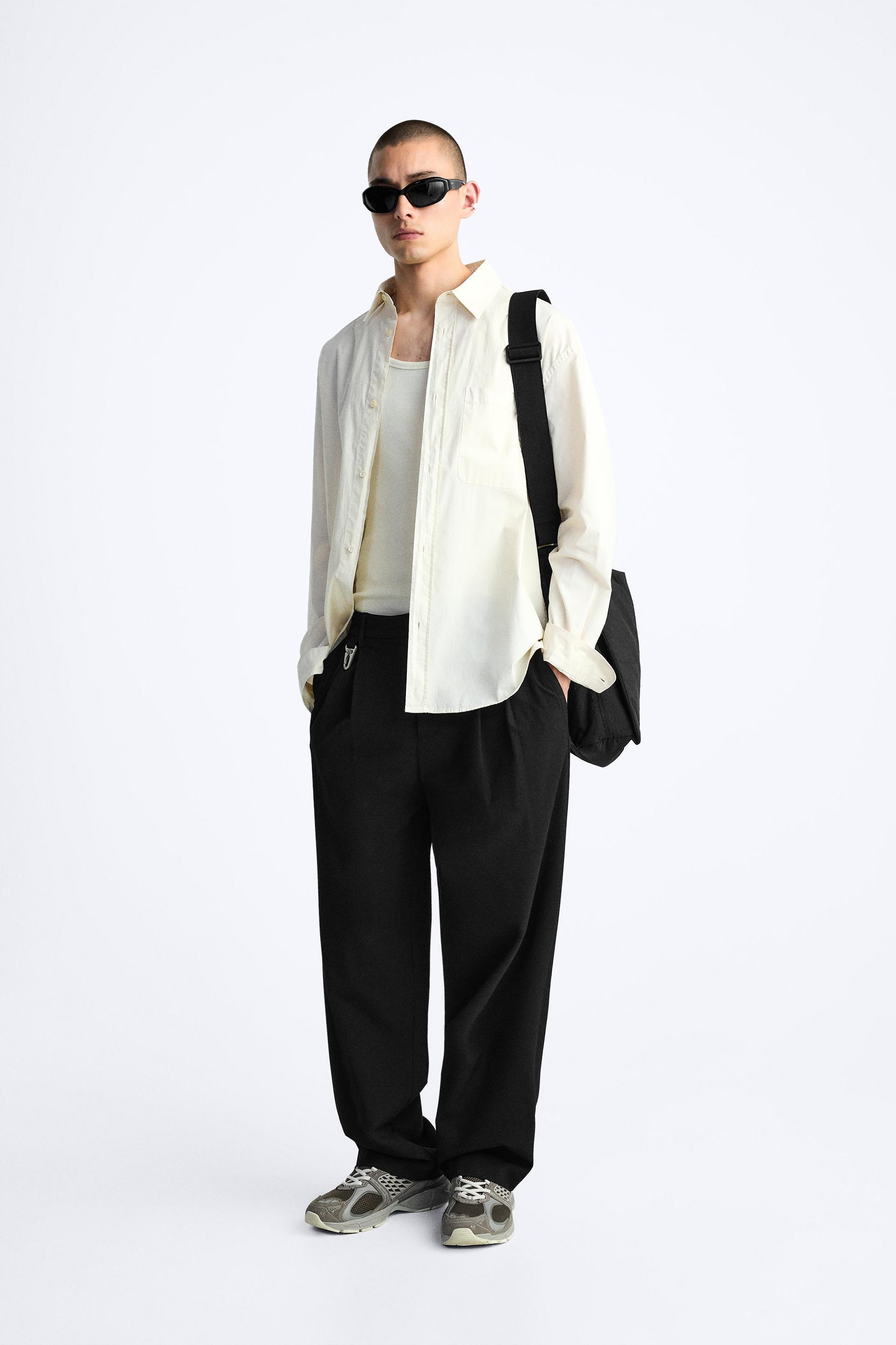 PLEATED WIDE FIT PANTS Product Image