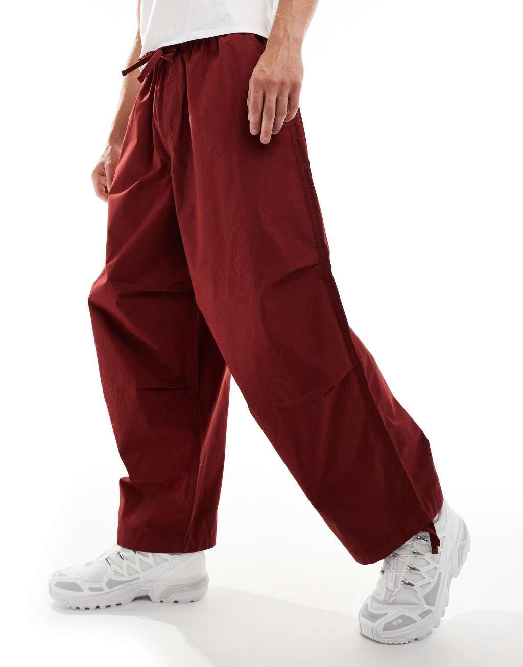 ASOS DESIGN baggy balloon parachute pant in burgundy Product Image