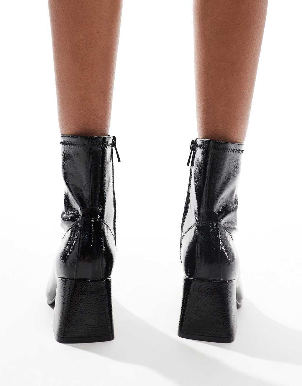 Stradivarius heeled boots in patent black Product Image