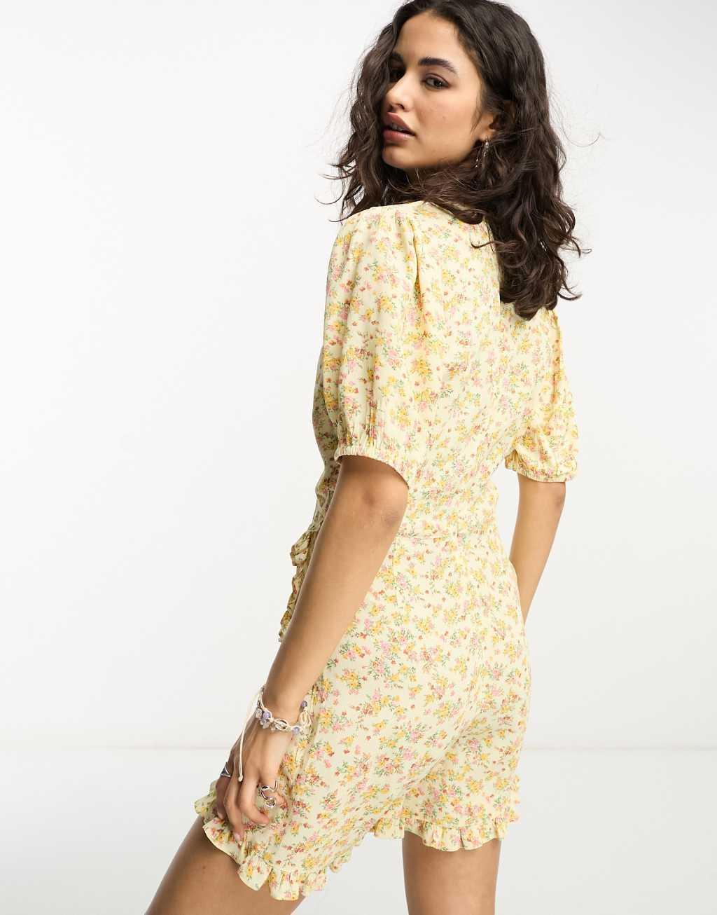 Reclaimed Vintage wrap tea romper with ruffles in yellow ditsy floral Product Image