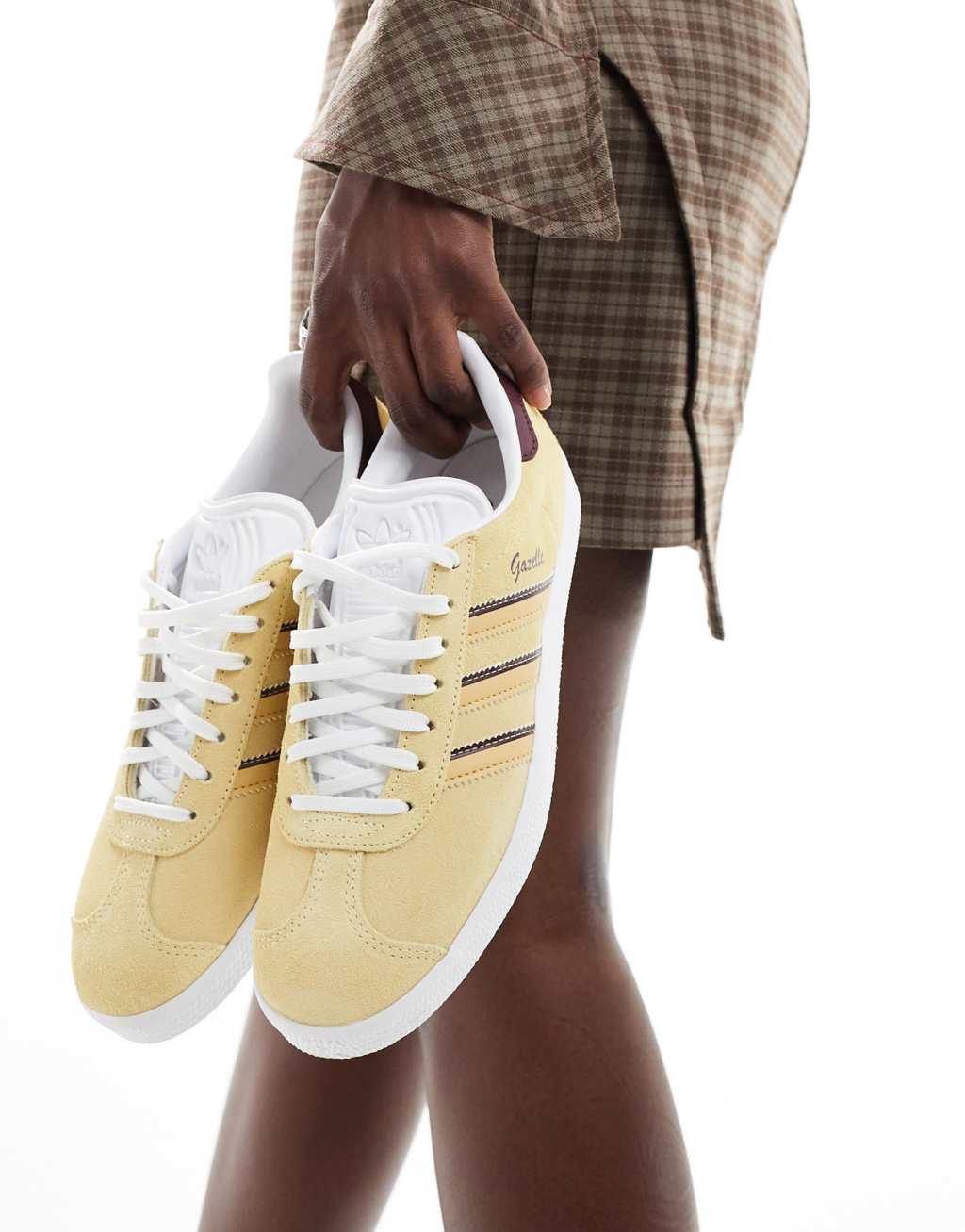 adidas Originals Gazelle sneakers in yellow and burgundy Product Image