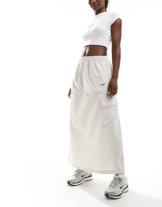 Nike Woven 2 n 1 maxi and mini skirt with zip detail in beige Product Image