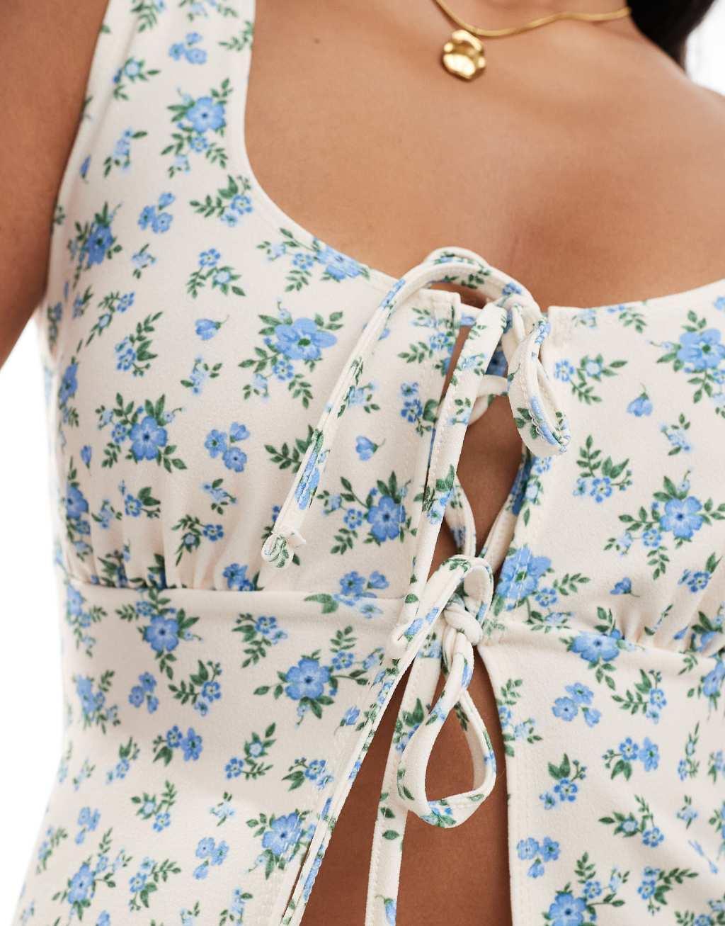 ASOS DESIGN tie front milkmaid top with trim detail in beige ditsy floral Product Image