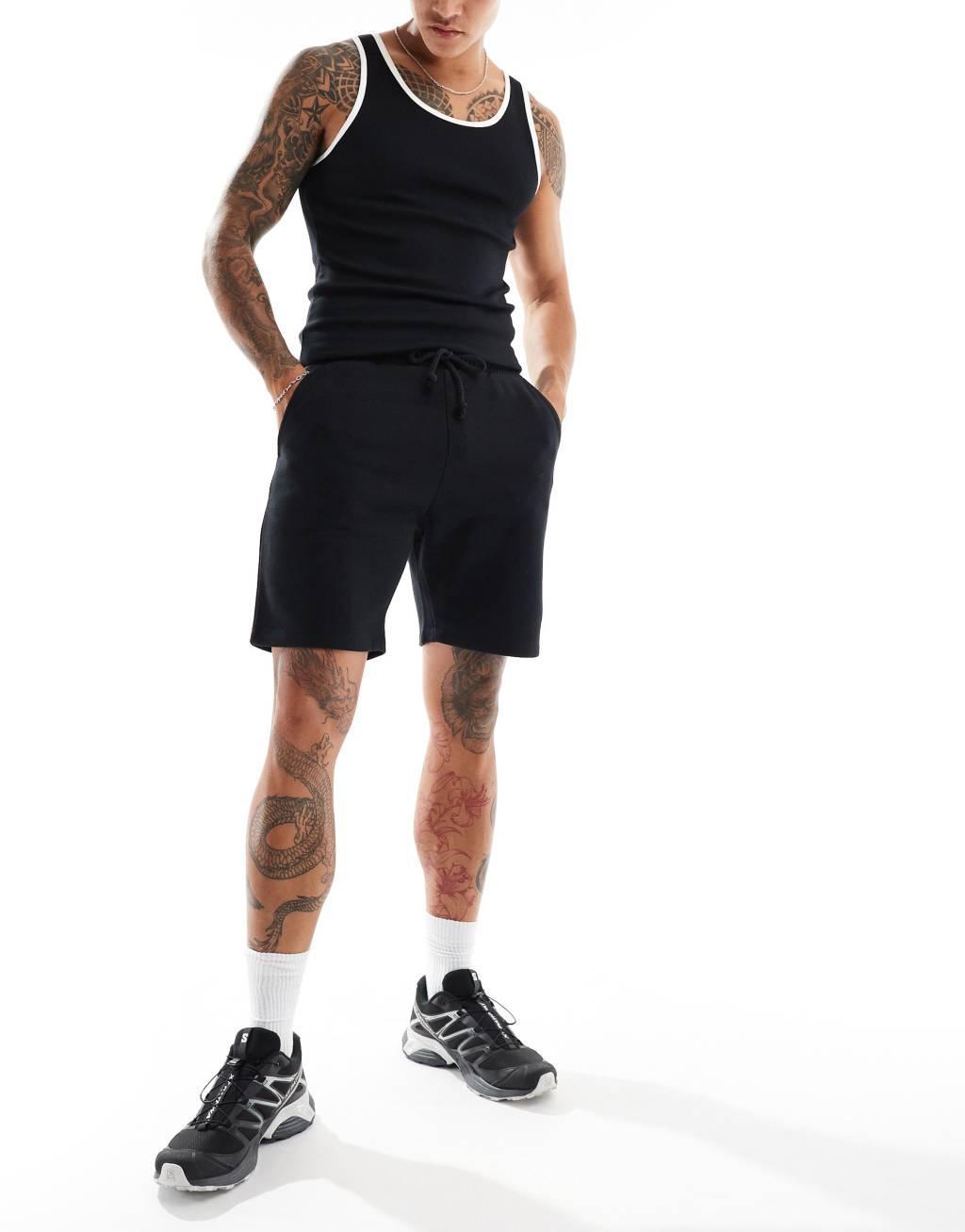 COLLUSION jersey shorts in black Product Image