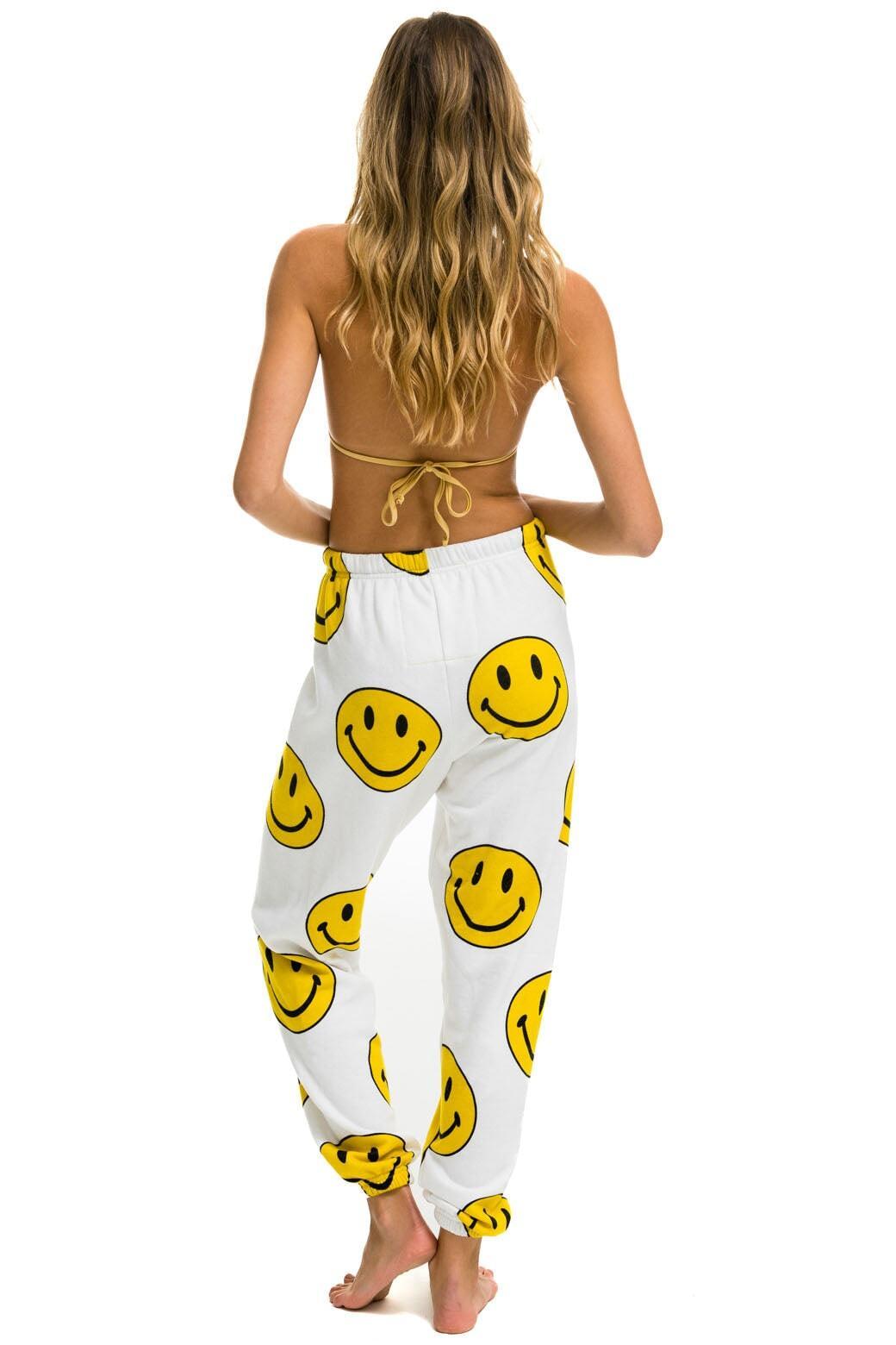 SMILEY REPEAT SWEATPANTS - WHITE Female Product Image