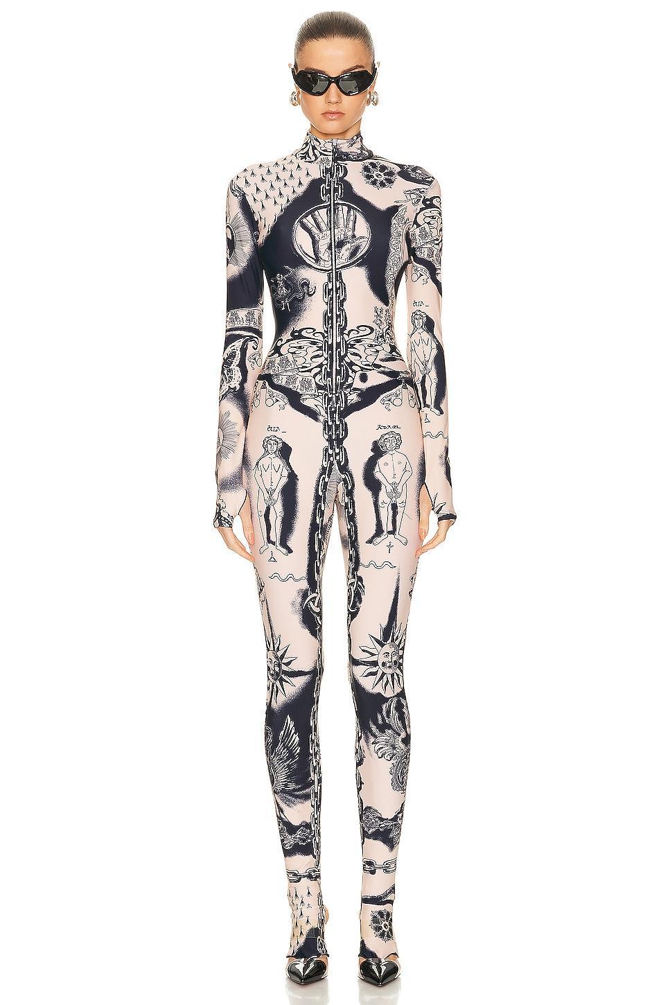 Jean Paul Gaultier Printed Heraldique Long Sleeve High Neck Jumpsuit in Nude Product Image