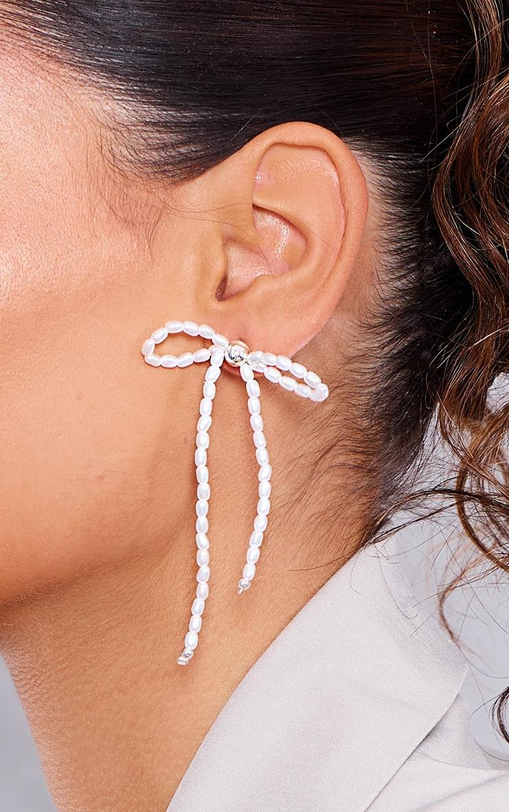 Silver Beaded Bow Tassel Earrings Product Image