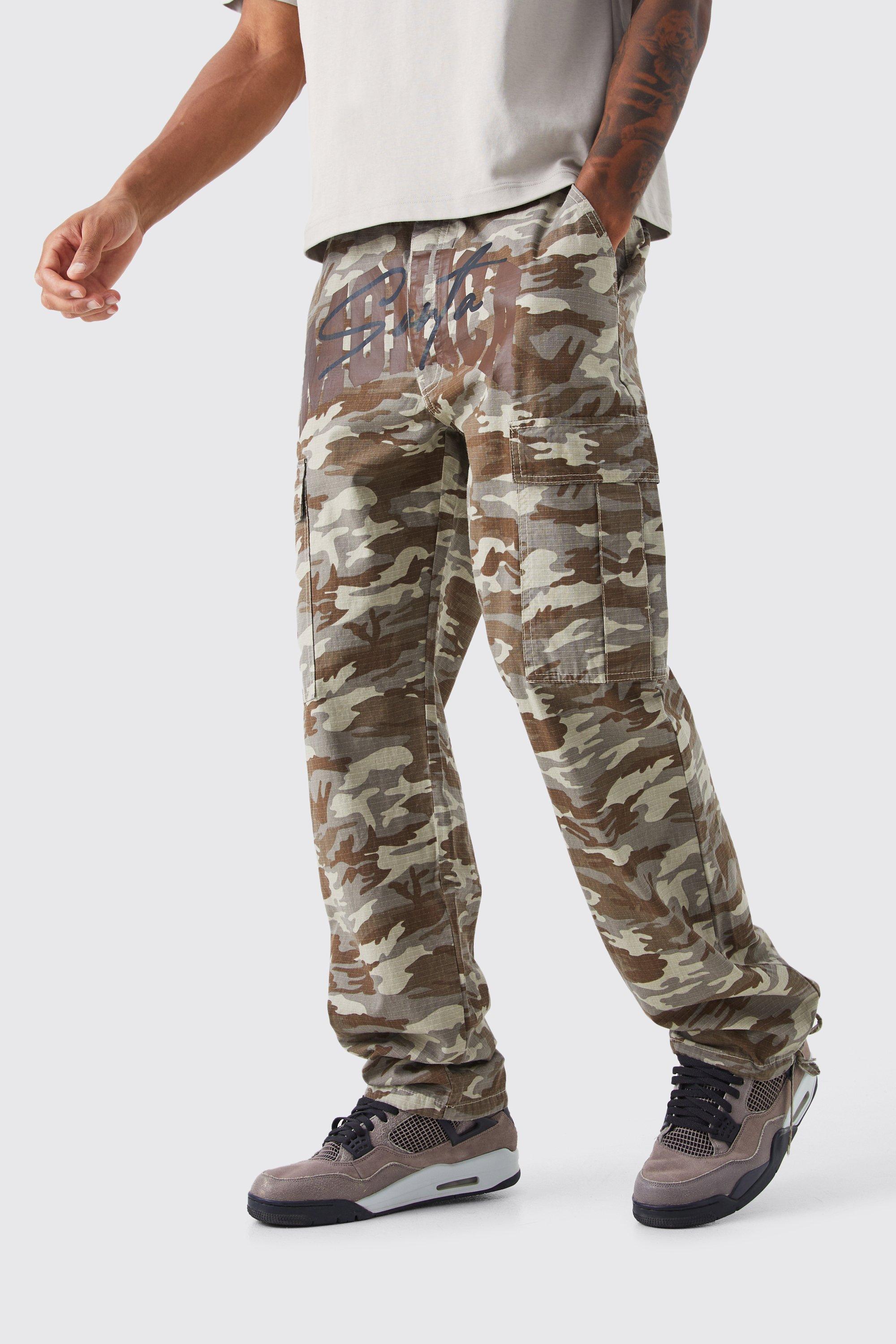 Tall Relaxed Cargo Varsity Slogan Print Camo Pants | boohooMAN USA Product Image