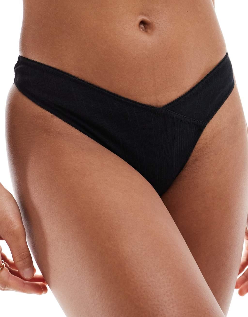 Cotton On cotton pointelle thong briefs in black Product Image