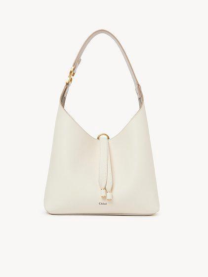 Small Marcie hobo bag in grained leather Product Image